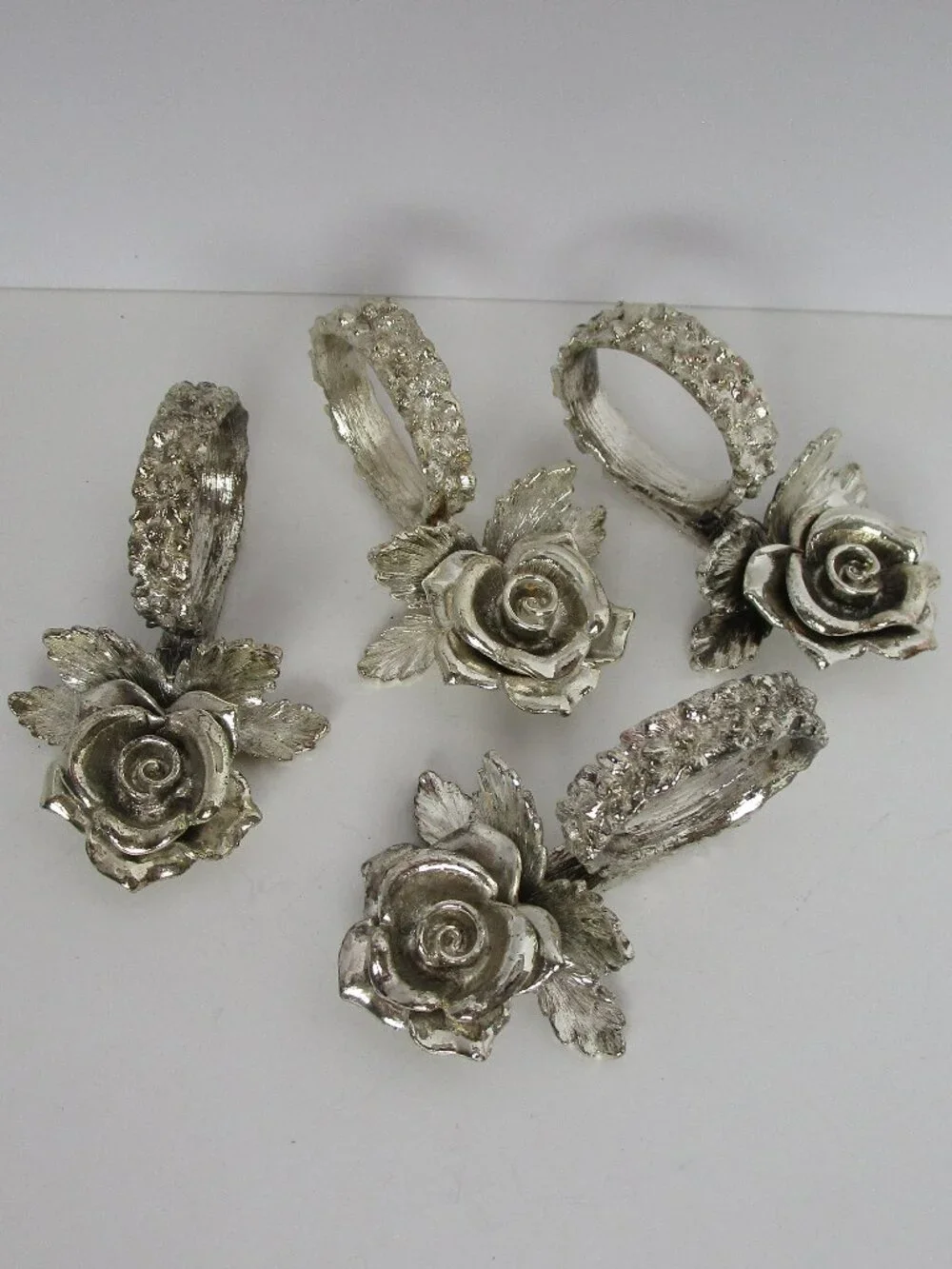 heavy molded metal napkin ring set